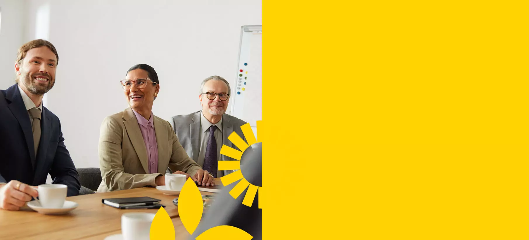 Cheerful people are discussing in the meeting room