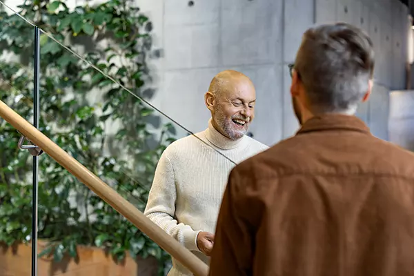 Two people discussing